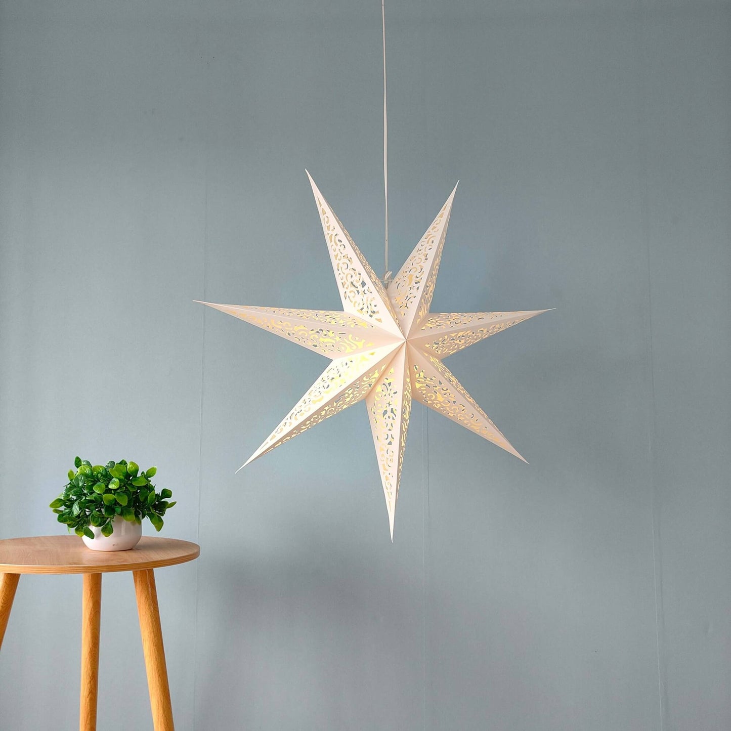 Side view of 29 inch white paper star lamps for home decor