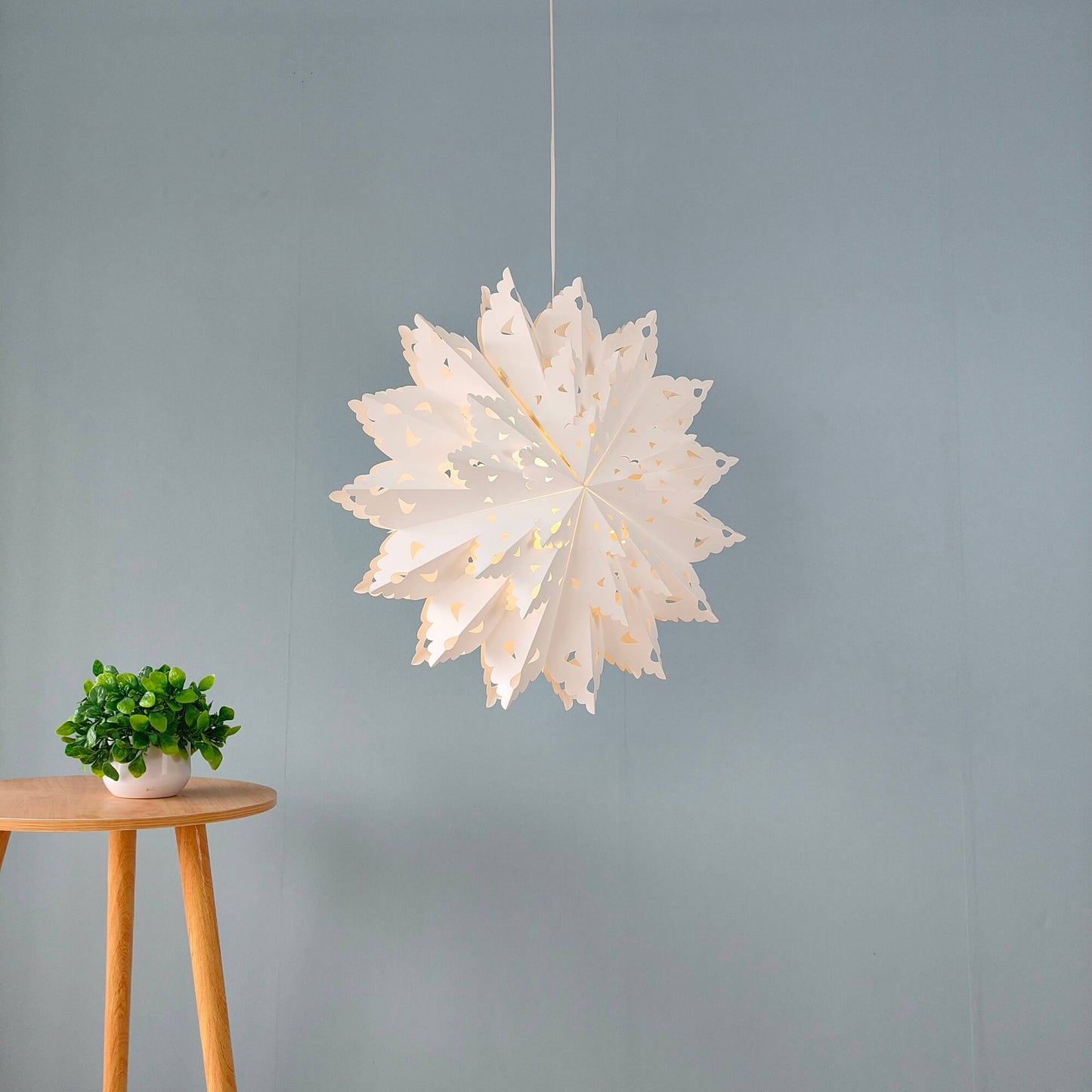 Close-up detail of 22 inch white snowflake paper lamps design